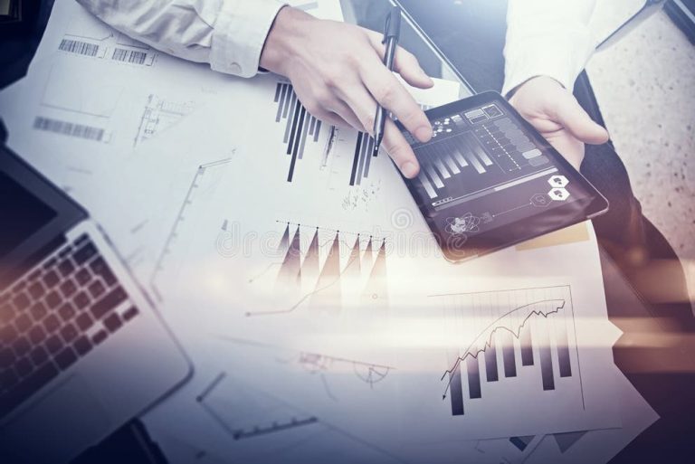 finance-working-process-double-exposure-photo-woman-showing-business-reports-modern-tablet-diagram-screen-banker-manager-holding-70412090